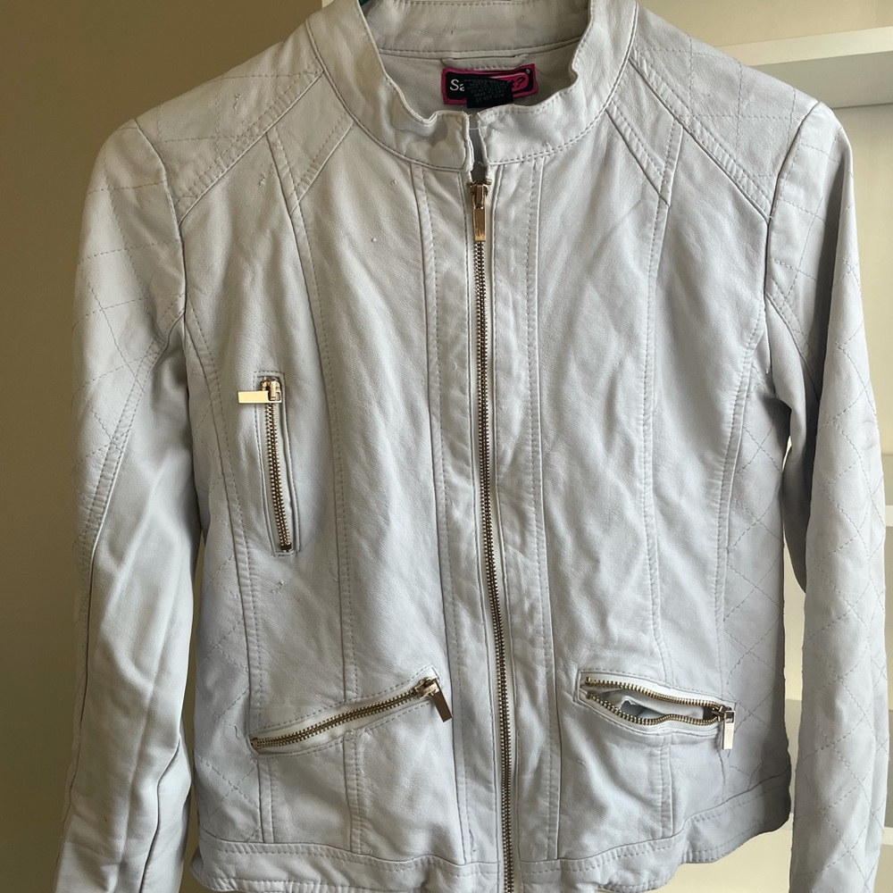 White leather with good trims.